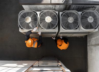 men-working-with-equipment-full-shot